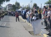 Camat Lalabata Lepas Lomba Gerak Jalan HUT RI ke-81 Tingkat Pelajar